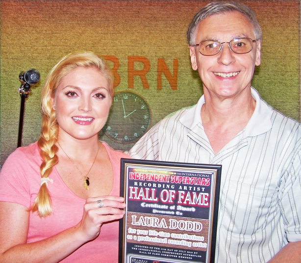 "Laura Dodd" posing with the award received in the post from Keith Bradford